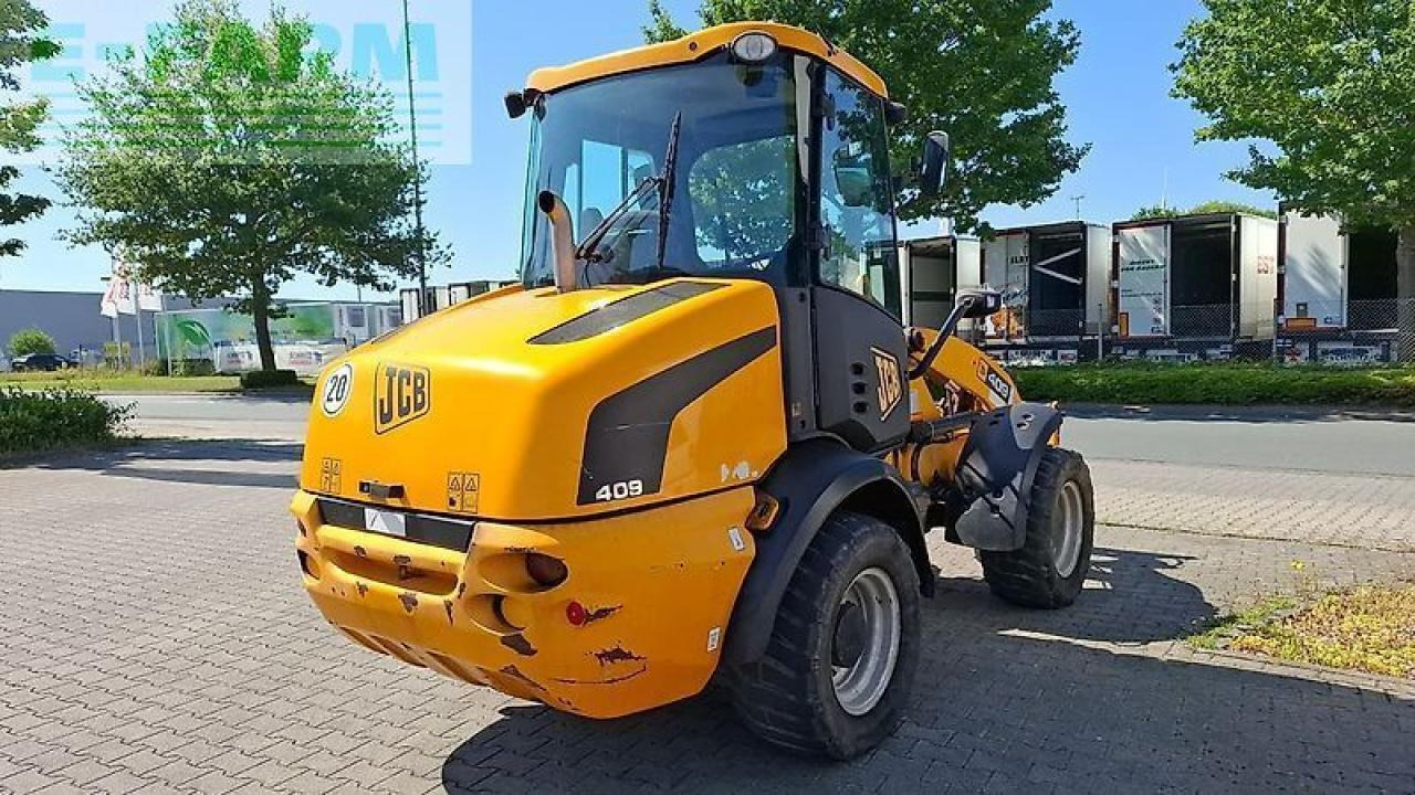JCB 409 - Mini bager: slika JCB 409 - Mini bager JCB 409 - Mini bager: slika JCB 409 - Mini bager