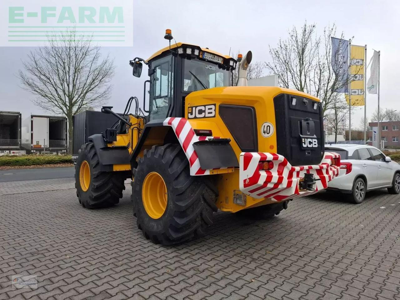 Mini bager JCB 427 agri: slika Mini bager JCB 427 agri
