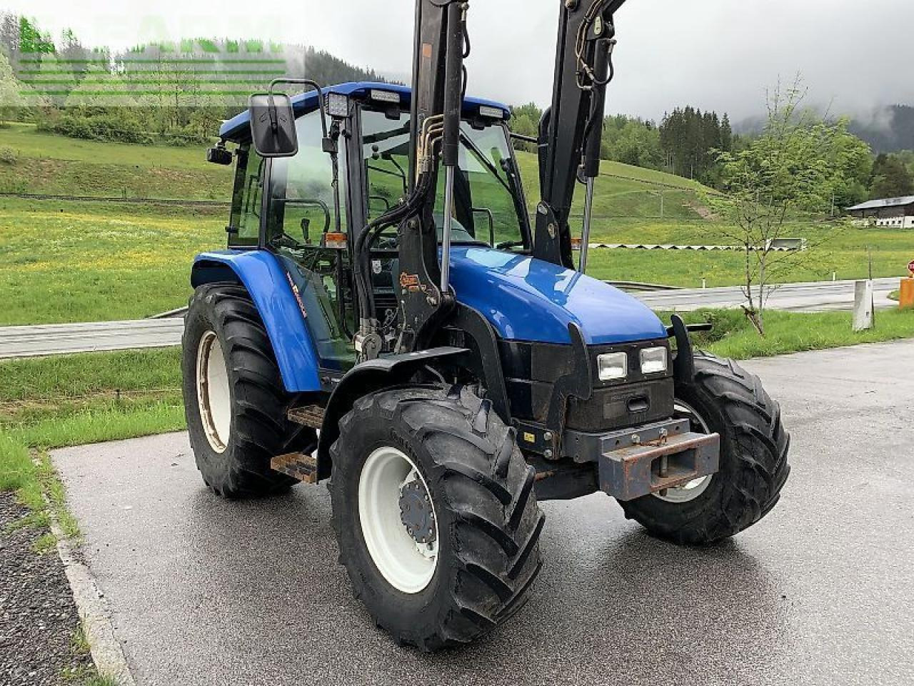 New Holland tl 70 a + hauer frontlader A - Traktor: slika New Holland tl 70 a + hauer frontlader A - Traktor New Holland tl 70 a + hauer frontlader A - Traktor: slika New Holland tl 70 a + hauer frontlader A - Traktor