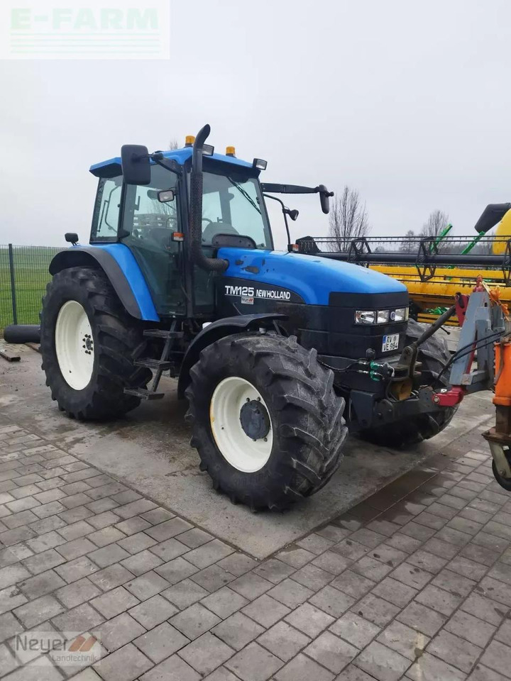 New Holland tm 125 - Traktor: slika New Holland tm 125 - Traktor New Holland tm 125 - Traktor: slika New Holland tm 125 - Traktor
