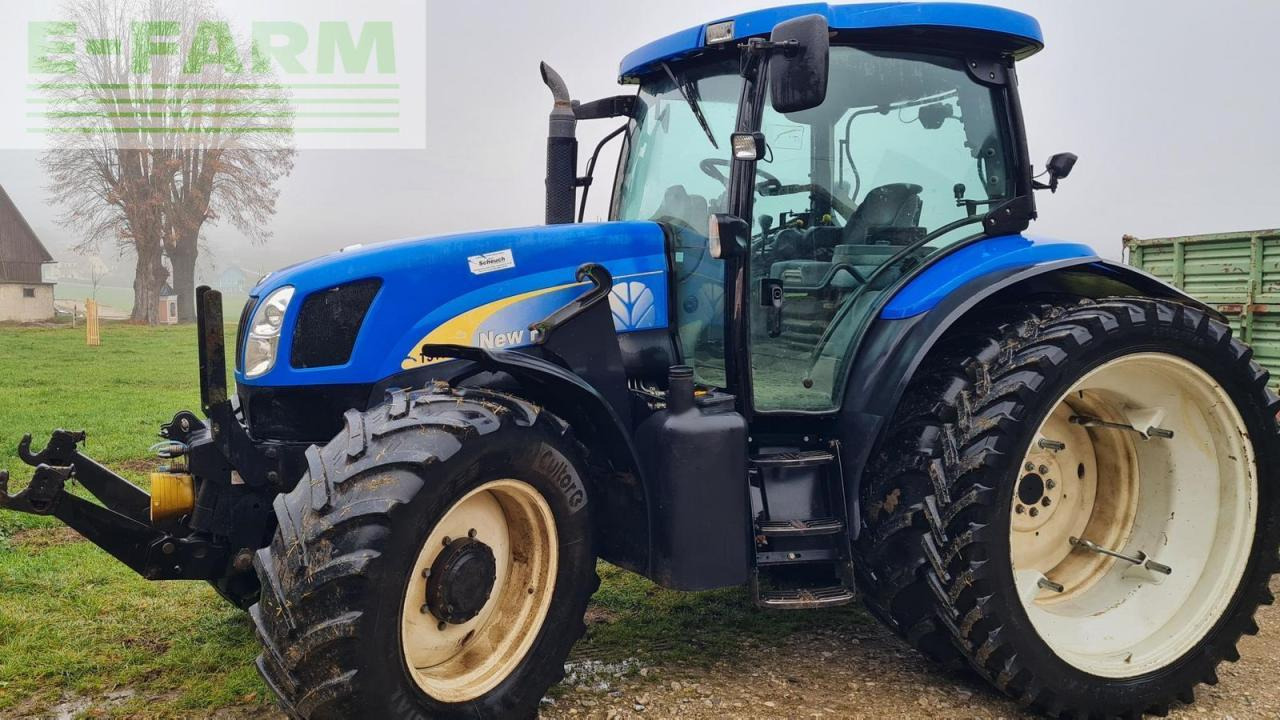 New Holland ts115a - Traktor: slika New Holland ts115a - Traktor New Holland ts115a - Traktor: slika New Holland ts115a - Traktor