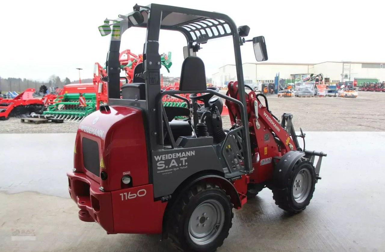 Weidemann 1160-11 stunden - Utovarivač na kotačima: slika Weidemann 1160-11 stunden - Utovarivač na kotačima Weidemann 1160-11 stunden - Utovarivač na kotačima: slika Weidemann 1160-11 stunden - Utovarivač na kotačima