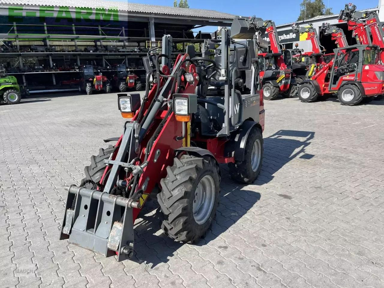 Weidemann 1160e mit 1400h, hohe hubhöhe - Utovarivač na kotačima: slika Weidemann 1160e mit 1400h, hohe hubhöhe - Utovarivač na kotačima Weidemann 1160e mit 1400h, hohe hubhöhe - Utovarivač na kotačima: slika Weidemann 1160e mit 1400h, hohe hubhöhe - Utovarivač na kotačima
