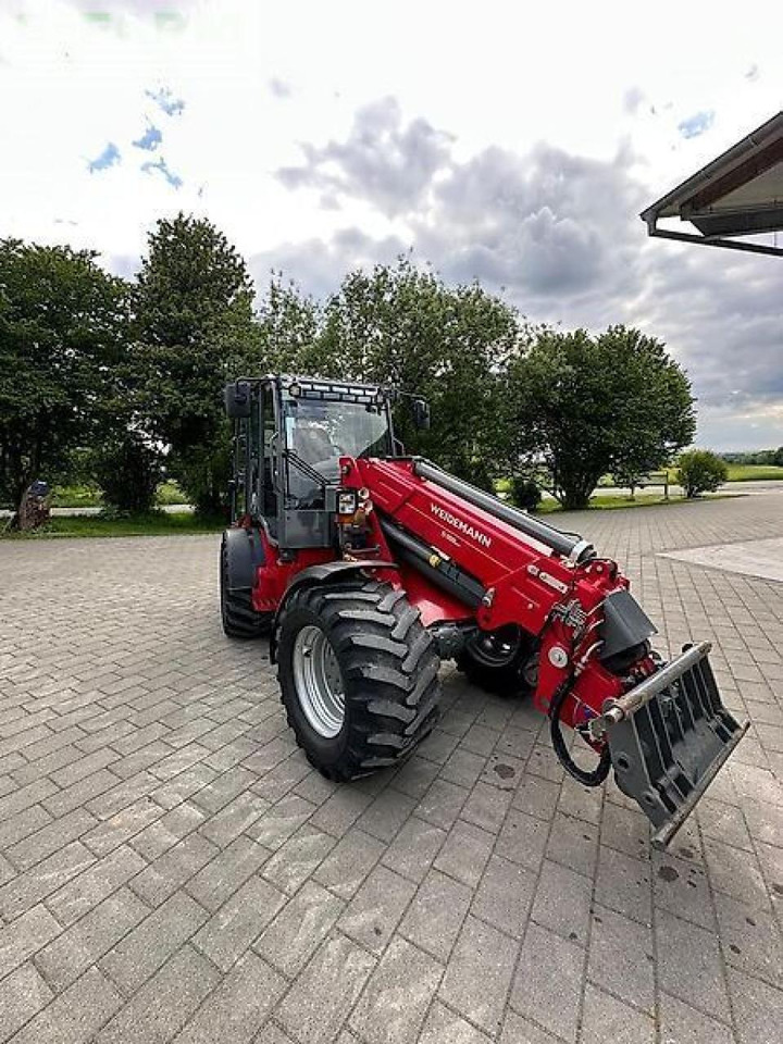 Weidemann teleskopradlader 5080t lader - Utovarivač na kotačima: slika Weidemann teleskopradlader 5080t lader - Utovarivač na kotačima Weidemann teleskopradlader 5080t lader - Utovarivač na kotačima: slika Weidemann teleskopradlader 5080t lader - Utovarivač na kotačima