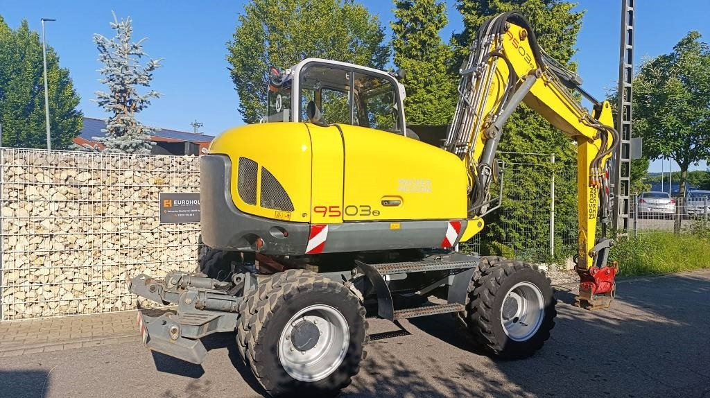 Wacker Neuson 9503 Bagger Powertilt, SW Martin, Verstellausleger - Bager na kotačima: slika Wacker Neuson 9503 Bagger Powertilt, SW Martin, Verstellausleger - Bager na kotačima Wacker Neuson 9503 Bagger Powertilt, SW Martin, Verstellausleger - Bager na kotačima: slika Wacker Neuson 9503 Bagger Powertilt, SW Martin, Verstellausleger - Bager na kotačima
