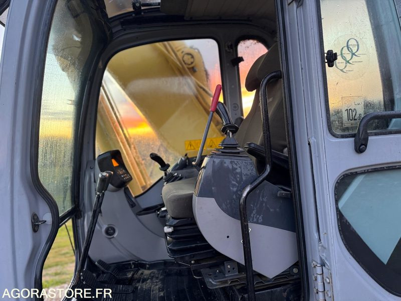 PELLE NEW HOLLAND E215B - 2009 - 11000 heures - Bager: slika PELLE NEW HOLLAND E215B - 2009 - 11000 heures - Bager PELLE NEW HOLLAND E215B - 2009 - 11000 heures - Bager: slika PELLE NEW HOLLAND E215B - 2009 - 11000 heures - Bager