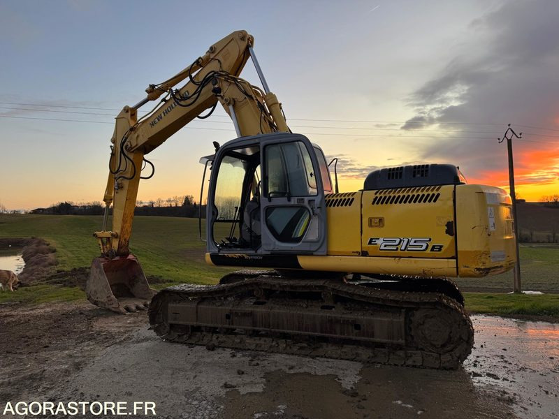 PELLE NEW HOLLAND E215B - 2009 - 11000 heures - Bager: slika PELLE NEW HOLLAND E215B - 2009 - 11000 heures - Bager PELLE NEW HOLLAND E215B - 2009 - 11000 heures - Bager: slika PELLE NEW HOLLAND E215B - 2009 - 11000 heures - Bager