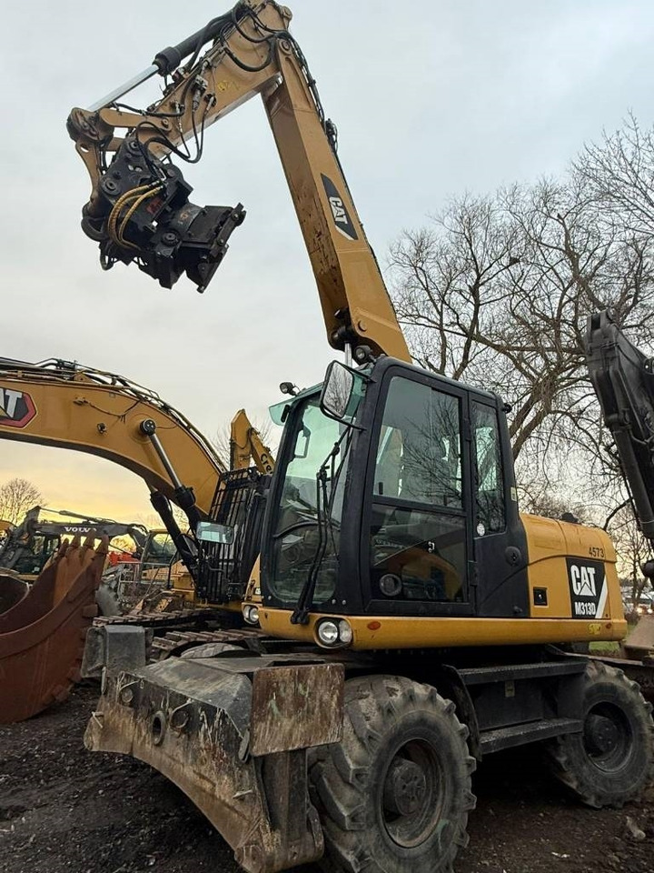 CAT 313 D - Bager na kotačima: slika CAT 313 D - Bager na kotačima CAT 313 D - Bager na kotačima: slika CAT 313 D - Bager na kotačima