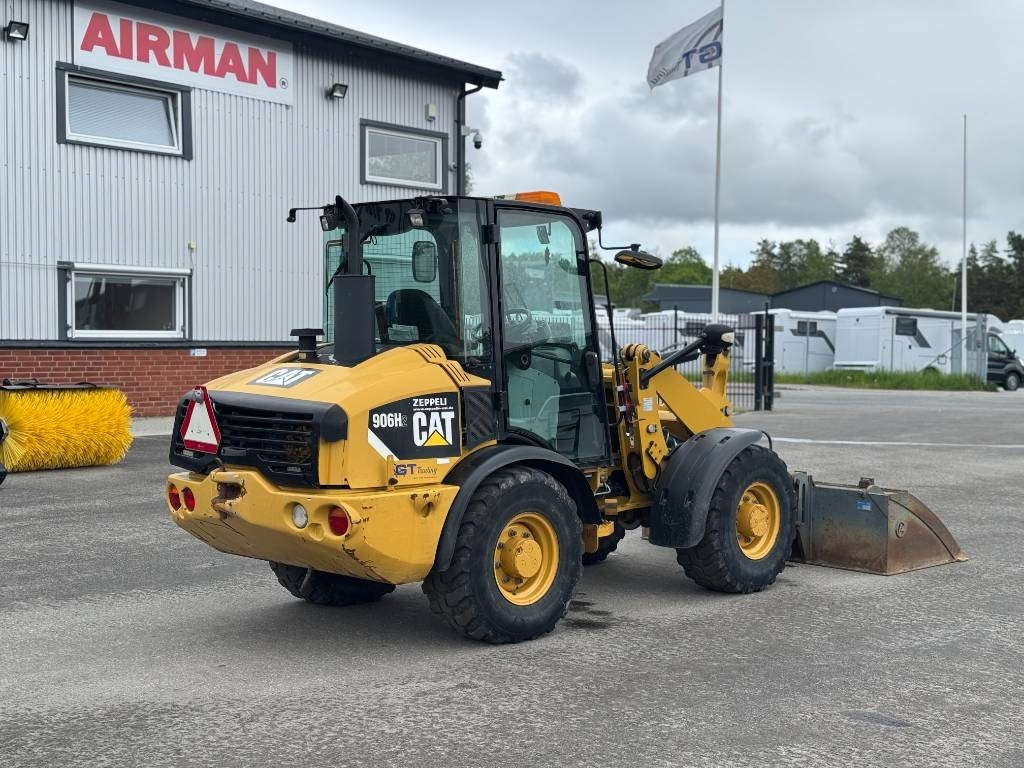 CAT 906 H - Utovarivač na kotačima: slika CAT 906 H - Utovarivač na kotačima CAT 906 H - Utovarivač na kotačima: slika CAT 906 H - Utovarivač na kotačima