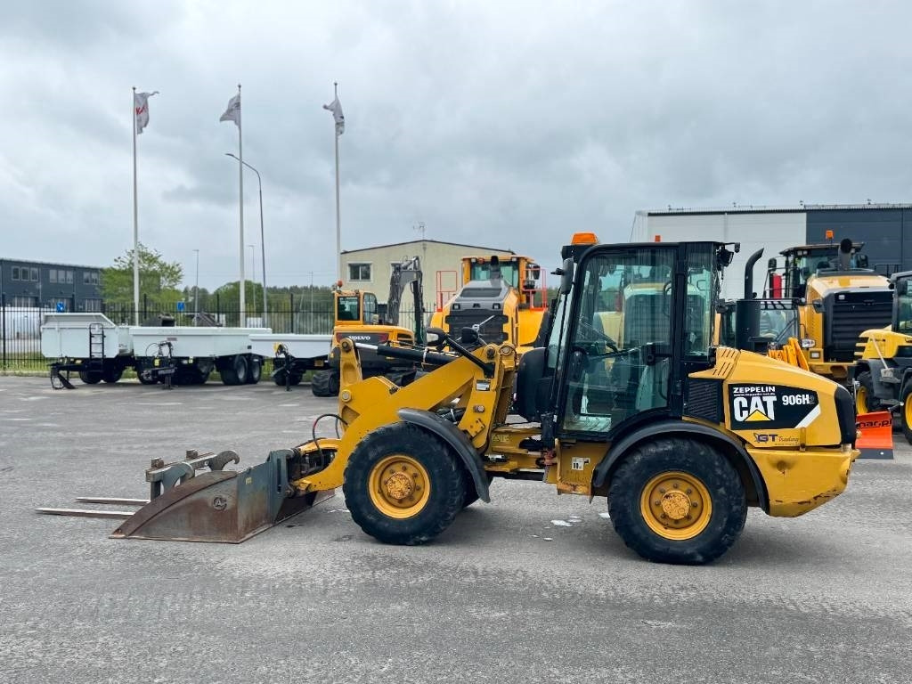 CAT 906 H - Utovarivač na kotačima: slika CAT 906 H - Utovarivač na kotačima CAT 906 H - Utovarivač na kotačima: slika CAT 906 H - Utovarivač na kotačima