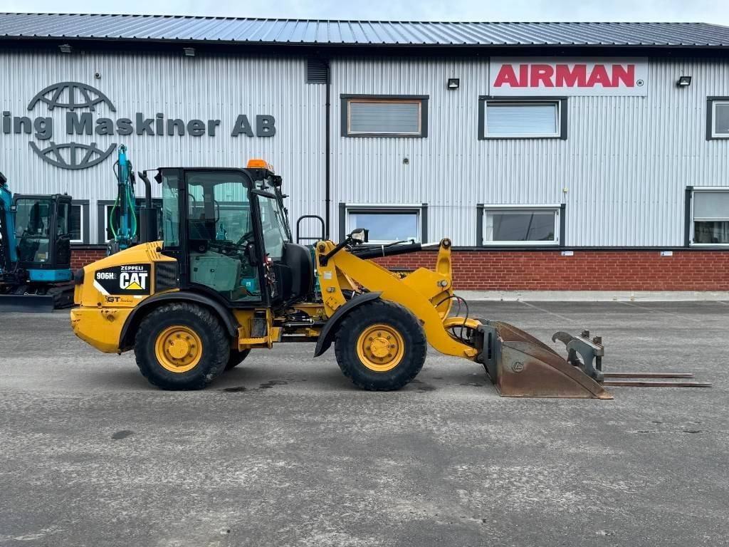 CAT 906 H - Utovarivač na kotačima: slika CAT 906 H - Utovarivač na kotačima CAT 906 H - Utovarivač na kotačima: slika CAT 906 H - Utovarivač na kotačima