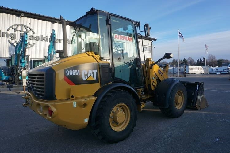 CAT 906 M - Utovarivač na kotačima: slika CAT 906 M - Utovarivač na kotačima CAT 906 M - Utovarivač na kotačima: slika CAT 906 M - Utovarivač na kotačima