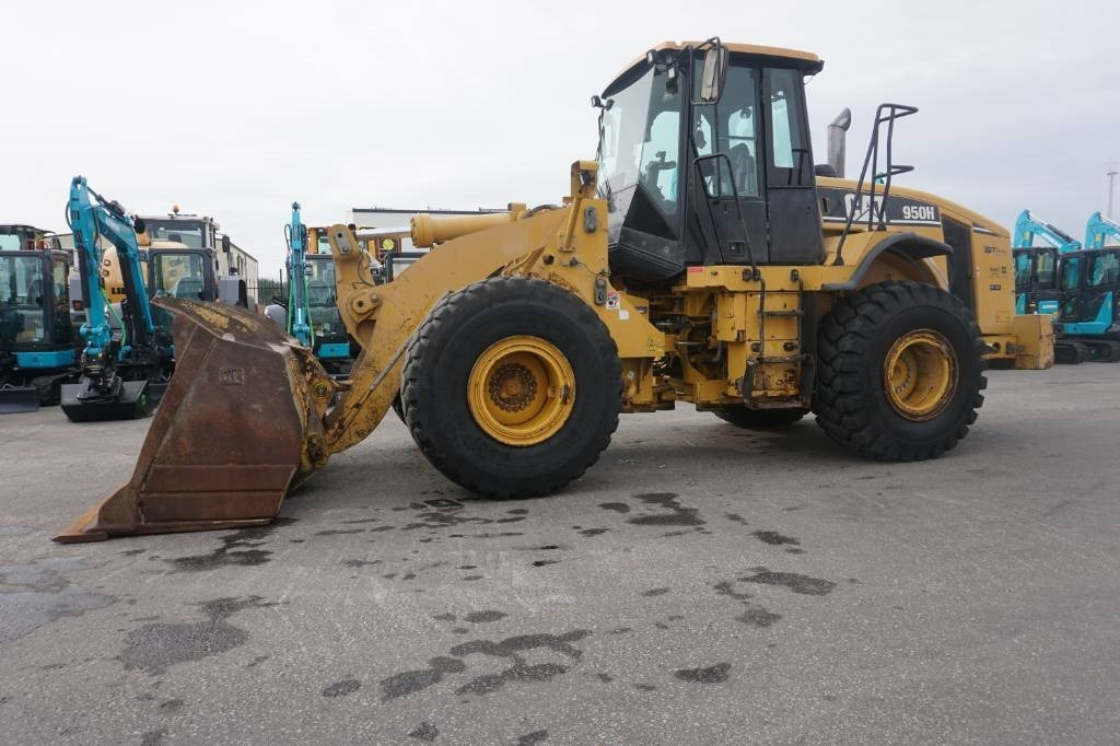 CAT 950 H - Utovarivač na kotačima: slika CAT 950 H - Utovarivač na kotačima CAT 950 H - Utovarivač na kotačima: slika CAT 950 H - Utovarivač na kotačima