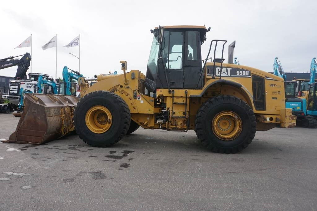 CAT 950 H - Utovarivač na kotačima: slika CAT 950 H - Utovarivač na kotačima CAT 950 H - Utovarivač na kotačima: slika CAT 950 H - Utovarivač na kotačima
