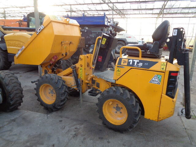 JCB 1T-2S5 - Mini istovarivač: slika JCB 1T-2S5 - Mini istovarivač JCB 1T-2S5 - Mini istovarivač: slika JCB 1T-2S5 - Mini istovarivač