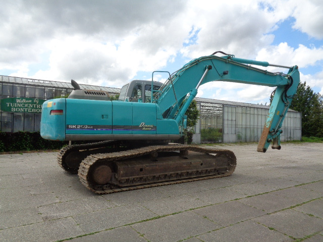 KOBELCO SK250 NLC-BE - Bager gusjeničar: slika KOBELCO SK250 NLC-BE - Bager gusjeničar KOBELCO SK250 NLC-BE - Bager gusjeničar: slika KOBELCO SK250 NLC-BE - Bager gusjeničar