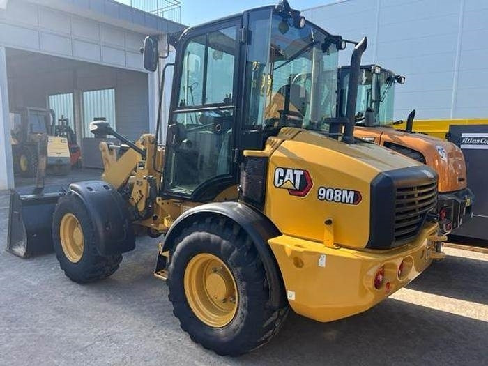 CAT 908M - Utovarivač na kotačima: slika CAT 908M - Utovarivač na kotačima CAT 908M - Utovarivač na kotačima: slika CAT 908M - Utovarivač na kotačima