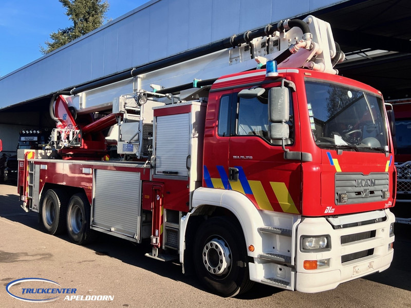 MAN TGA 26.350 Magirus ALP 320L = 32 meter, Waterpump, 6x4, Steel springs - Kamion: slika MAN TGA 26.350 Magirus ALP 320L = 32 meter, Waterpump, 6x4, Steel springs - Kamion MAN TGA 26.350 Magirus ALP 320L = 32 meter, Waterpump, 6x4, Steel springs - Kamion: slika MAN TGA 26.350 Magirus ALP 320L = 32 meter, Waterpump, 6x4, Steel springs - Kamion