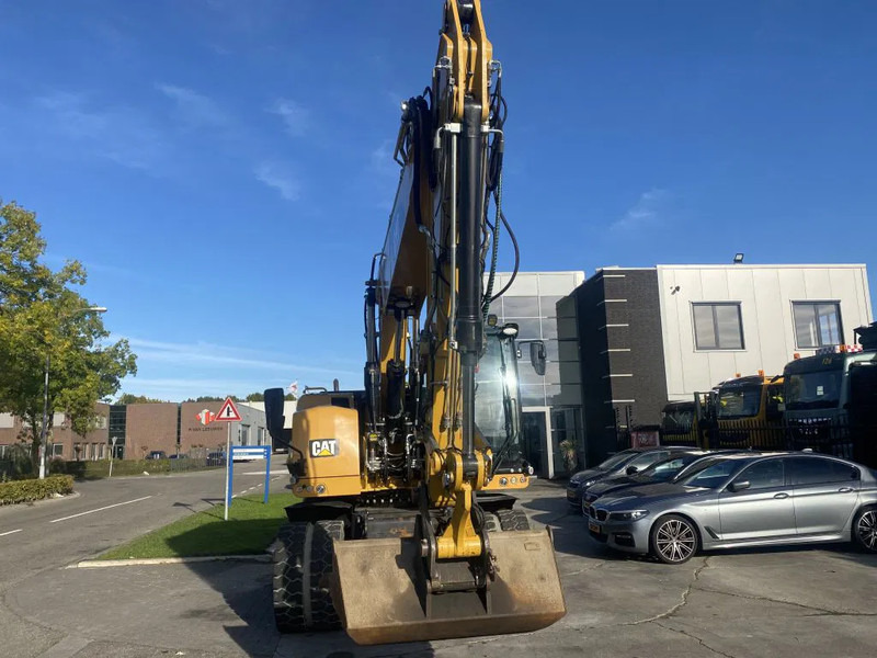 Caterpillar M318F - Bager na kotačima: slika Caterpillar M318F - Bager na kotačima Caterpillar M318F - Bager na kotačima: slika Caterpillar M318F - Bager na kotačima