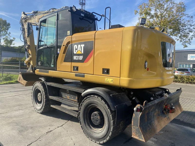 Caterpillar M318F - Bager na kotačima: slika Caterpillar M318F - Bager na kotačima Caterpillar M318F - Bager na kotačima: slika Caterpillar M318F - Bager na kotačima