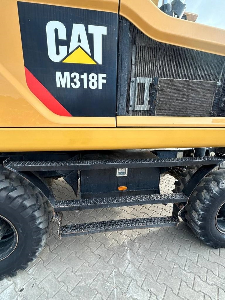 Bager na kotačima CAT M 318 F: slika Bager na kotačima CAT M 318 F Bager na kotačima CAT M 318 F: slika Bager na kotačima CAT M 318 F