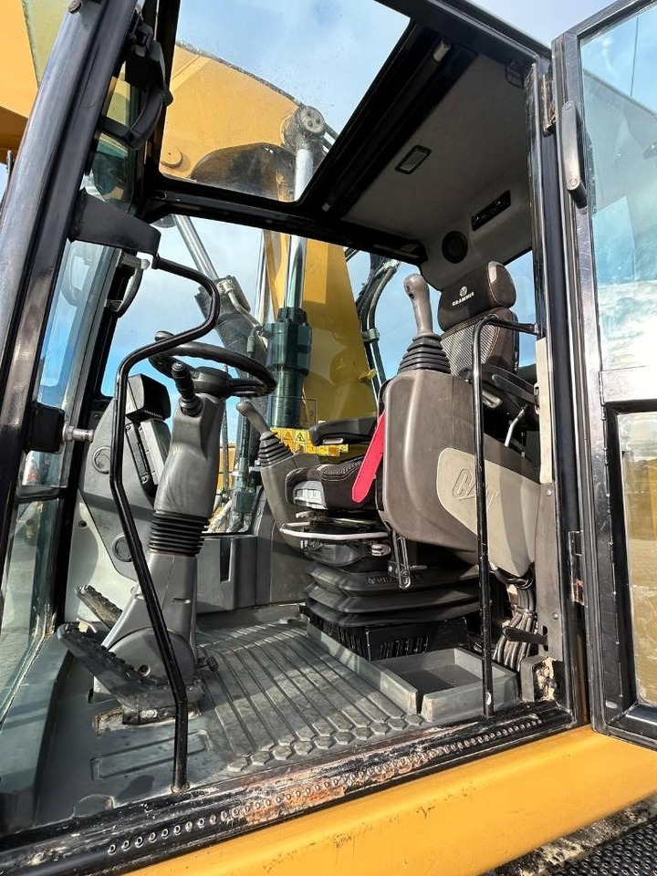 Bager na kotačima CAT M 318 F: slika Bager na kotačima CAT M 318 F Bager na kotačima CAT M 318 F: slika Bager na kotačima CAT M 318 F