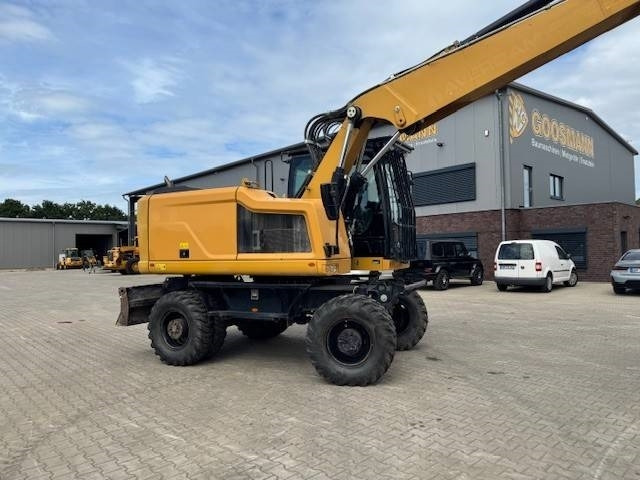 CAT M 318F - Bager na kotačima: slika CAT M 318F - Bager na kotačima CAT M 318F - Bager na kotačima: slika CAT M 318F - Bager na kotačima