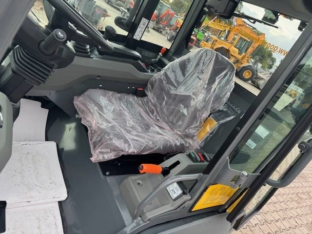 Utovarivač na kotačima Kramer 5045: slika Utovarivač na kotačima Kramer 5045 Utovarivač na kotačima Kramer 5045: slika Utovarivač na kotačima Kramer 5045