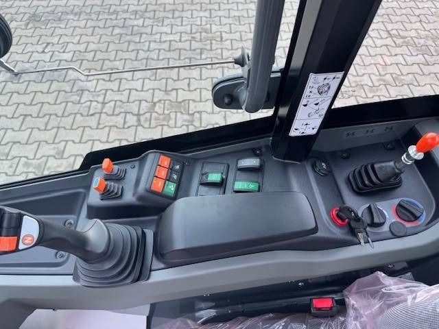 Utovarivač na kotačima Kramer 5045: slika Utovarivač na kotačima Kramer 5045 Utovarivač na kotačima Kramer 5045: slika Utovarivač na kotačima Kramer 5045