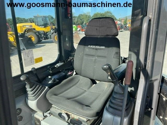 NEW HOLLAND E 29 B SR - Mini bager: slika NEW HOLLAND E 29 B SR - Mini bager NEW HOLLAND E 29 B SR - Mini bager: slika NEW HOLLAND E 29 B SR - Mini bager