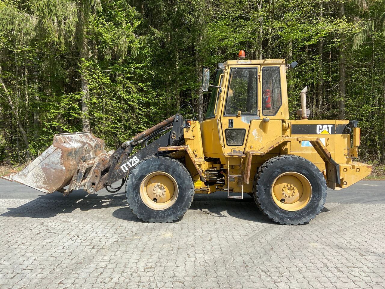 CATERPILLAR IT 12 B - Utovarivač na kotačima: slika CATERPILLAR IT 12 B - Utovarivač na kotačima CATERPILLAR IT 12 B - Utovarivač na kotačima: slika CATERPILLAR IT 12 B - Utovarivač na kotačima