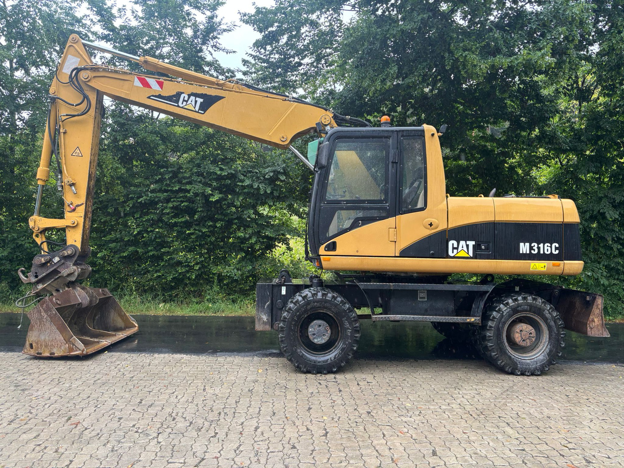 CATERPILLAR M 316 C - Bager na kotačima: slika CATERPILLAR M 316 C - Bager na kotačima CATERPILLAR M 316 C - Bager na kotačima: slika CATERPILLAR M 316 C - Bager na kotačima
