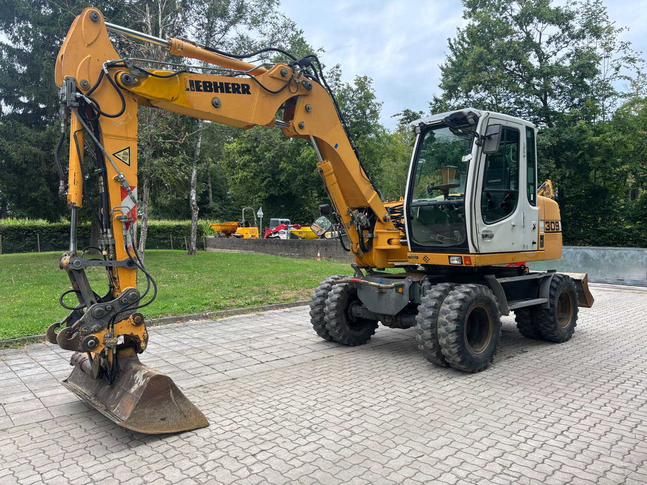 LIEBHERR A 309 Litronic - Bager na kotačima: slika LIEBHERR A 309 Litronic - Bager na kotačima LIEBHERR A 309 Litronic - Bager na kotačima: slika LIEBHERR A 309 Litronic - Bager na kotačima