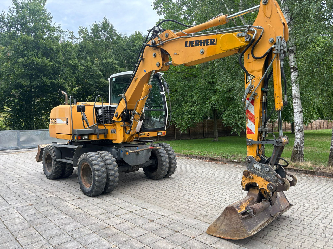 LIEBHERR A 309 Litronic - Bager na kotačima: slika LIEBHERR A 309 Litronic - Bager na kotačima LIEBHERR A 309 Litronic - Bager na kotačima: slika LIEBHERR A 309 Litronic - Bager na kotačima