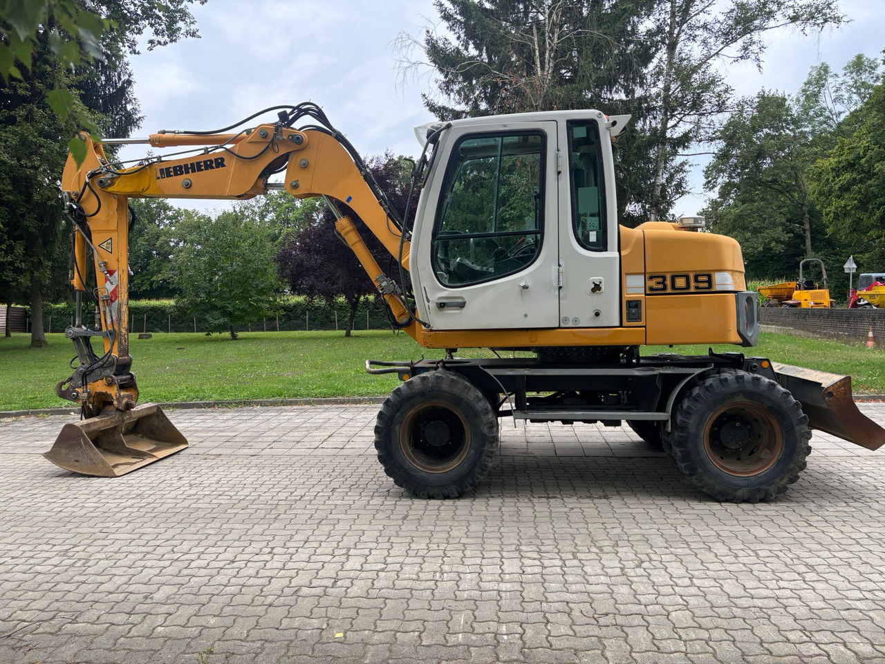 LIEBHERR A 309 Litronic - Bager na kotačima: slika LIEBHERR A 309 Litronic - Bager na kotačima LIEBHERR A 309 Litronic - Bager na kotačima: slika LIEBHERR A 309 Litronic - Bager na kotačima
