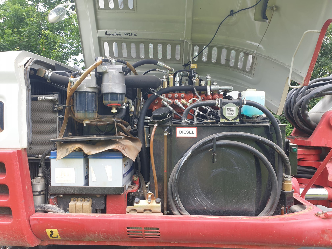 Bager na kotačima TAKEUCHI TB 295W: slika Bager na kotačima TAKEUCHI TB 295W Bager na kotačima TAKEUCHI TB 295W: slika Bager na kotačima TAKEUCHI TB 295W