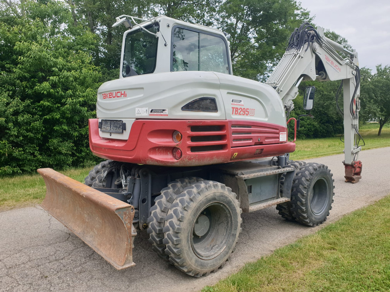 Bager na kotačima TAKEUCHI TB 295W: slika Bager na kotačima TAKEUCHI TB 295W Bager na kotačima TAKEUCHI TB 295W: slika Bager na kotačima TAKEUCHI TB 295W