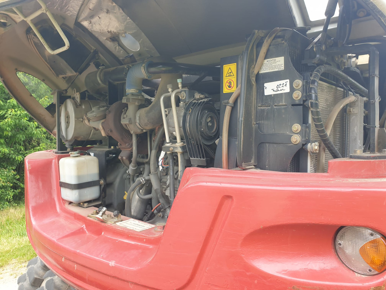 Bager na kotačima TAKEUCHI TB 295W: slika Bager na kotačima TAKEUCHI TB 295W Bager na kotačima TAKEUCHI TB 295W: slika Bager na kotačima TAKEUCHI TB 295W