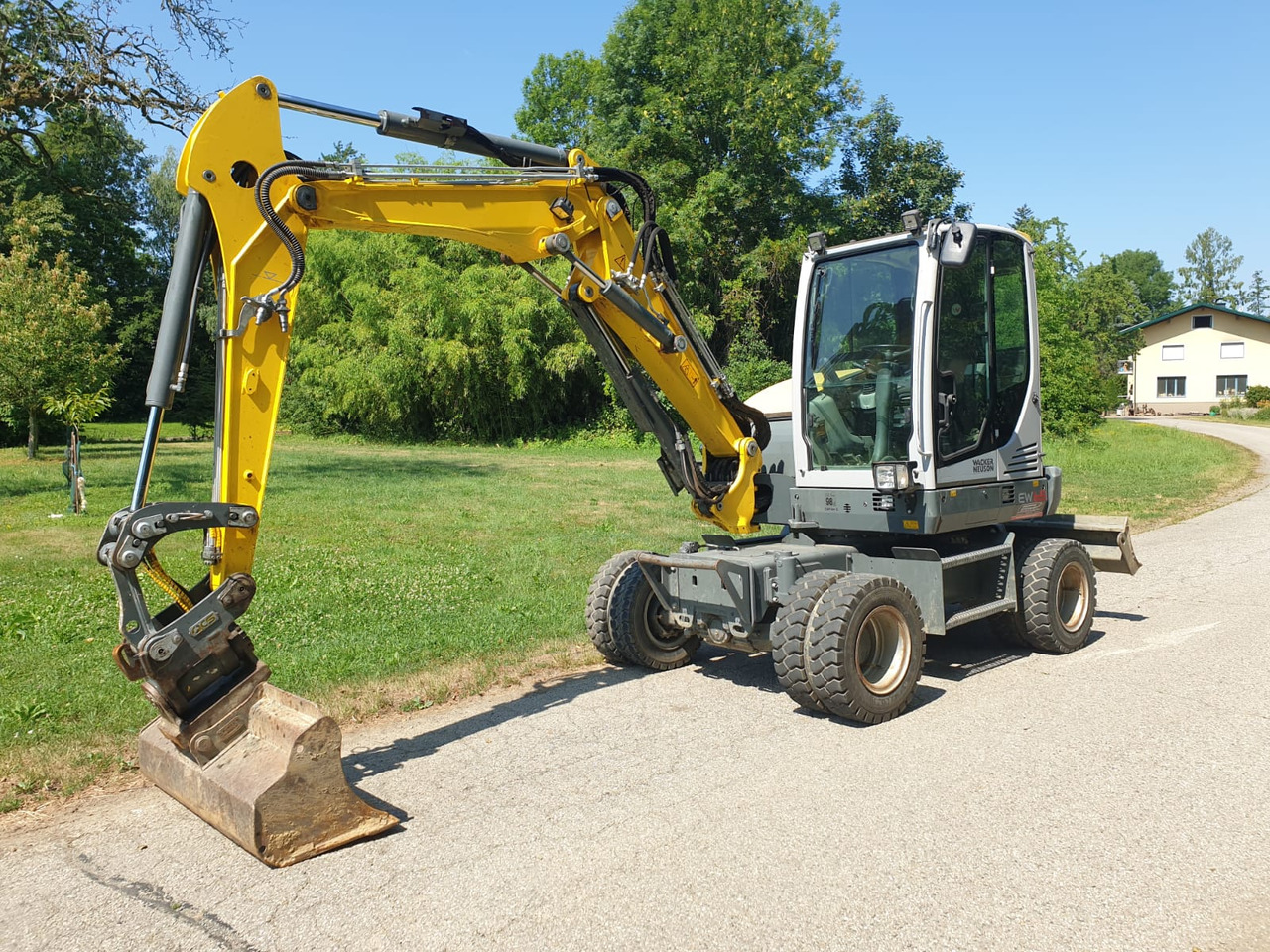 WACKER Neuson EW 65 - Bager na kotačima: slika WACKER Neuson EW 65 - Bager na kotačima WACKER Neuson EW 65 - Bager na kotačima: slika WACKER Neuson EW 65 - Bager na kotačima