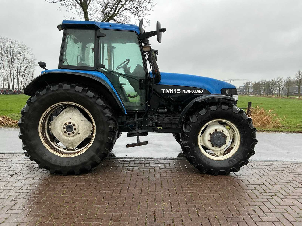 2002 NEW HOLLAND TM 115 ALL-WHEEL DRIVE FARM TRACTOR - Traktor: slika 2002 NEW HOLLAND TM 115 ALL-WHEEL DRIVE FARM TRACTOR - Traktor 2002 NEW HOLLAND TM 115 ALL-WHEEL DRIVE FARM TRACTOR - Traktor: slika 2002 NEW HOLLAND TM 115 ALL-WHEEL DRIVE FARM TRACTOR - Traktor
