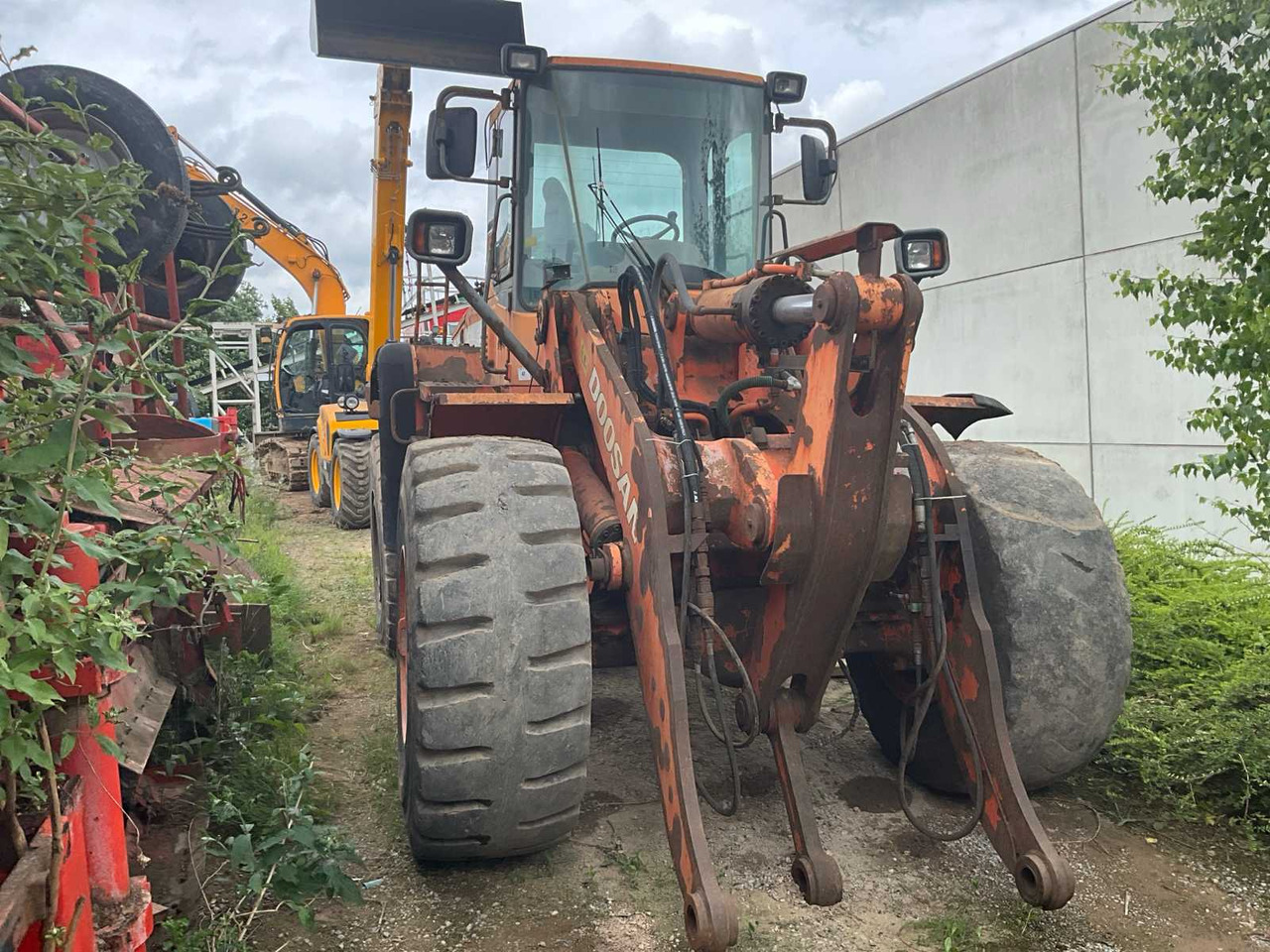 DOOSAN DL300 - Utovarivač na kotačima: slika DOOSAN DL300 - Utovarivač na kotačima DOOSAN DL300 - Utovarivač na kotačima: slika DOOSAN DL300 - Utovarivač na kotačima