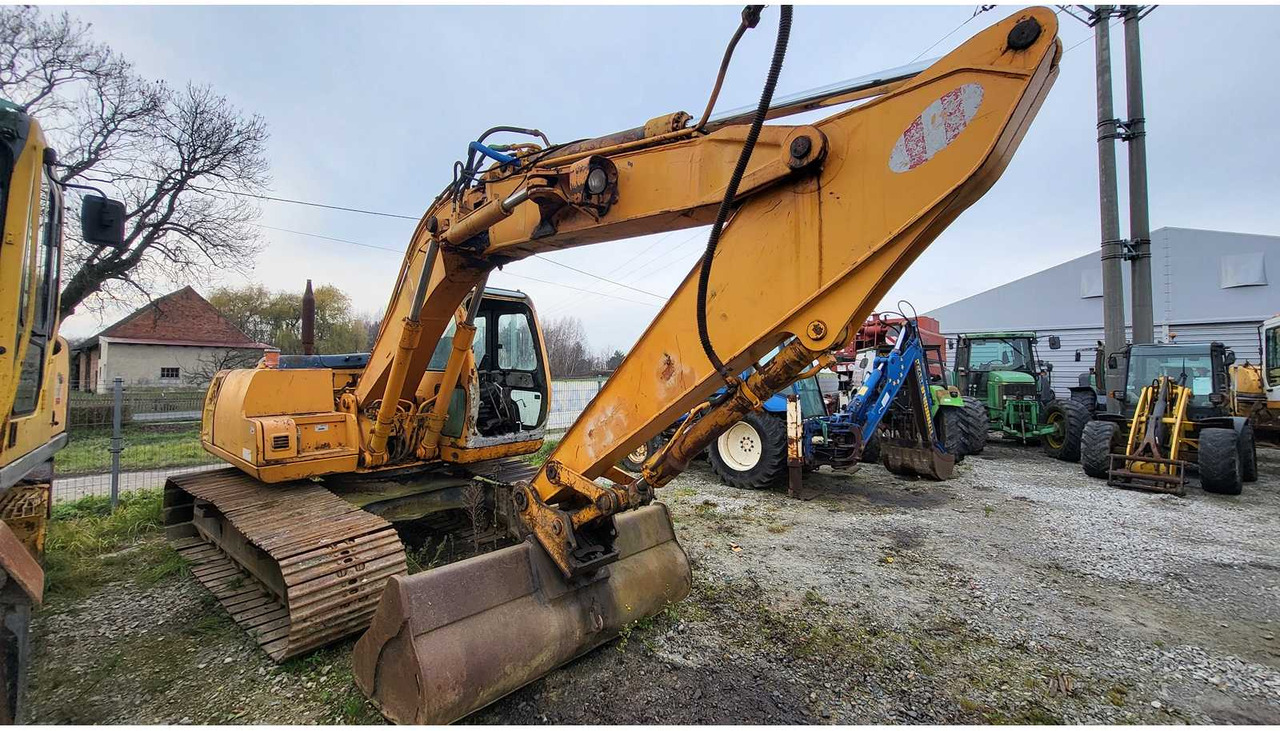 HYUNDAI ROBEX 130 LC TRACKED EXCAVATOR - Bager: slika HYUNDAI ROBEX 130 LC TRACKED EXCAVATOR - Bager HYUNDAI ROBEX 130 LC TRACKED EXCAVATOR - Bager: slika HYUNDAI ROBEX 130 LC TRACKED EXCAVATOR - Bager