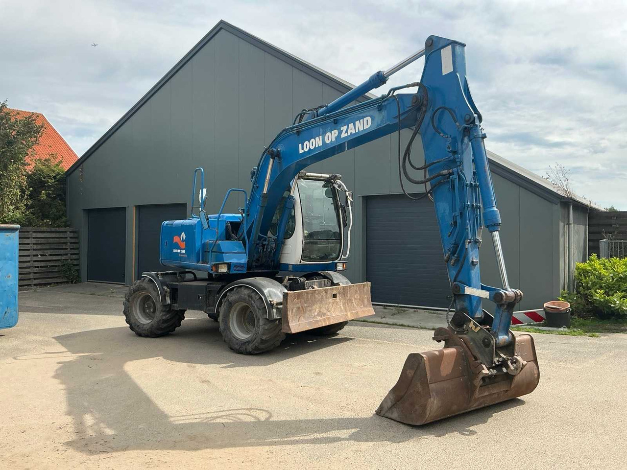 Hitachi ZX130W - Bager na kotačima: slika Hitachi ZX130W - Bager na kotačima Hitachi ZX130W - Bager na kotačima: slika Hitachi ZX130W - Bager na kotačima