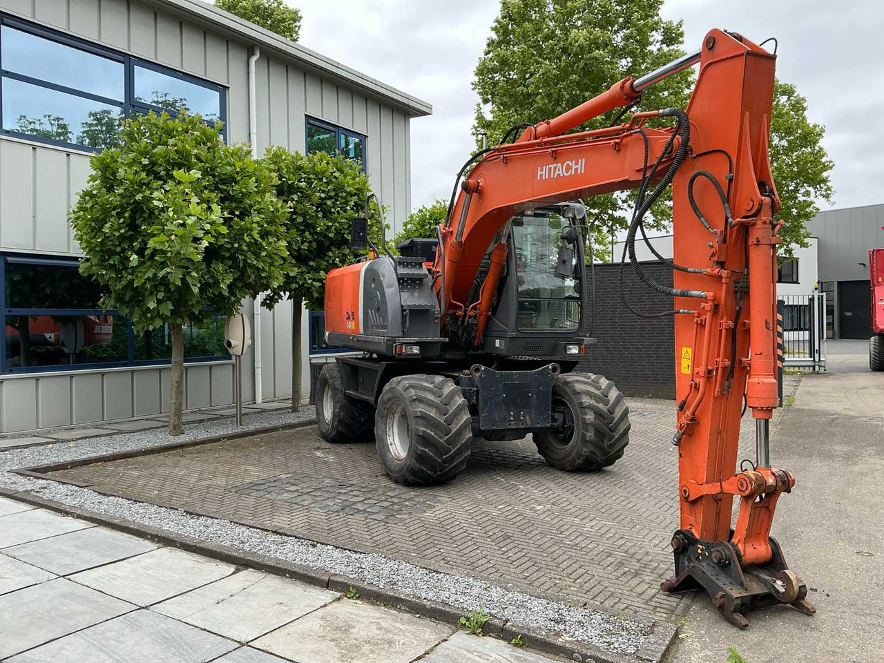 Hitachi ZX140W-3 - Bager na kotačima: slika Hitachi ZX140W-3 - Bager na kotačima Hitachi ZX140W-3 - Bager na kotačima: slika Hitachi ZX140W-3 - Bager na kotačima