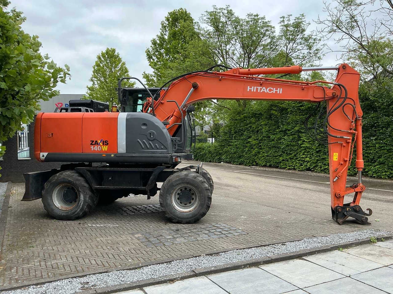 Hitachi ZX140W-3 - Bager na kotačima: slika Hitachi ZX140W-3 - Bager na kotačima Hitachi ZX140W-3 - Bager na kotačima: slika Hitachi ZX140W-3 - Bager na kotačima