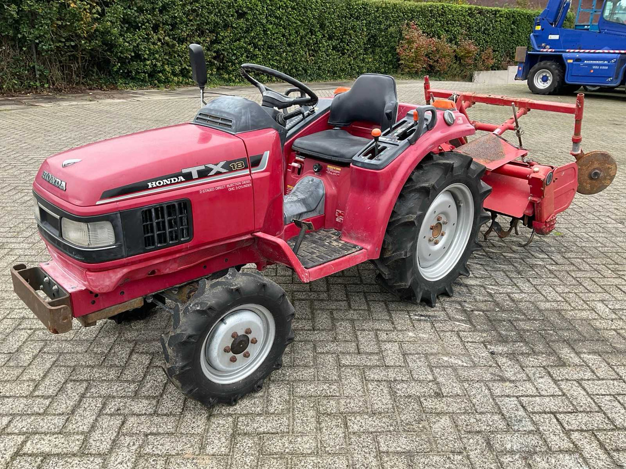 Honda TX18 - Mali traktor: slika Honda TX18 - Mali traktor Honda TX18 - Mali traktor: slika Honda TX18 - Mali traktor