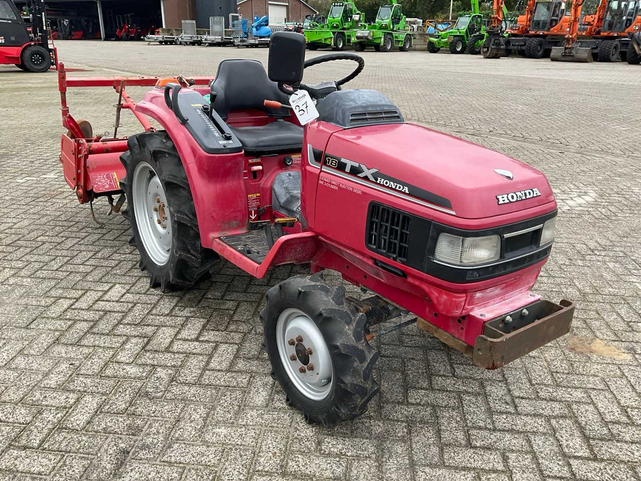 Honda TX18 - Mali traktor: slika Honda TX18 - Mali traktor Honda TX18 - Mali traktor: slika Honda TX18 - Mali traktor
