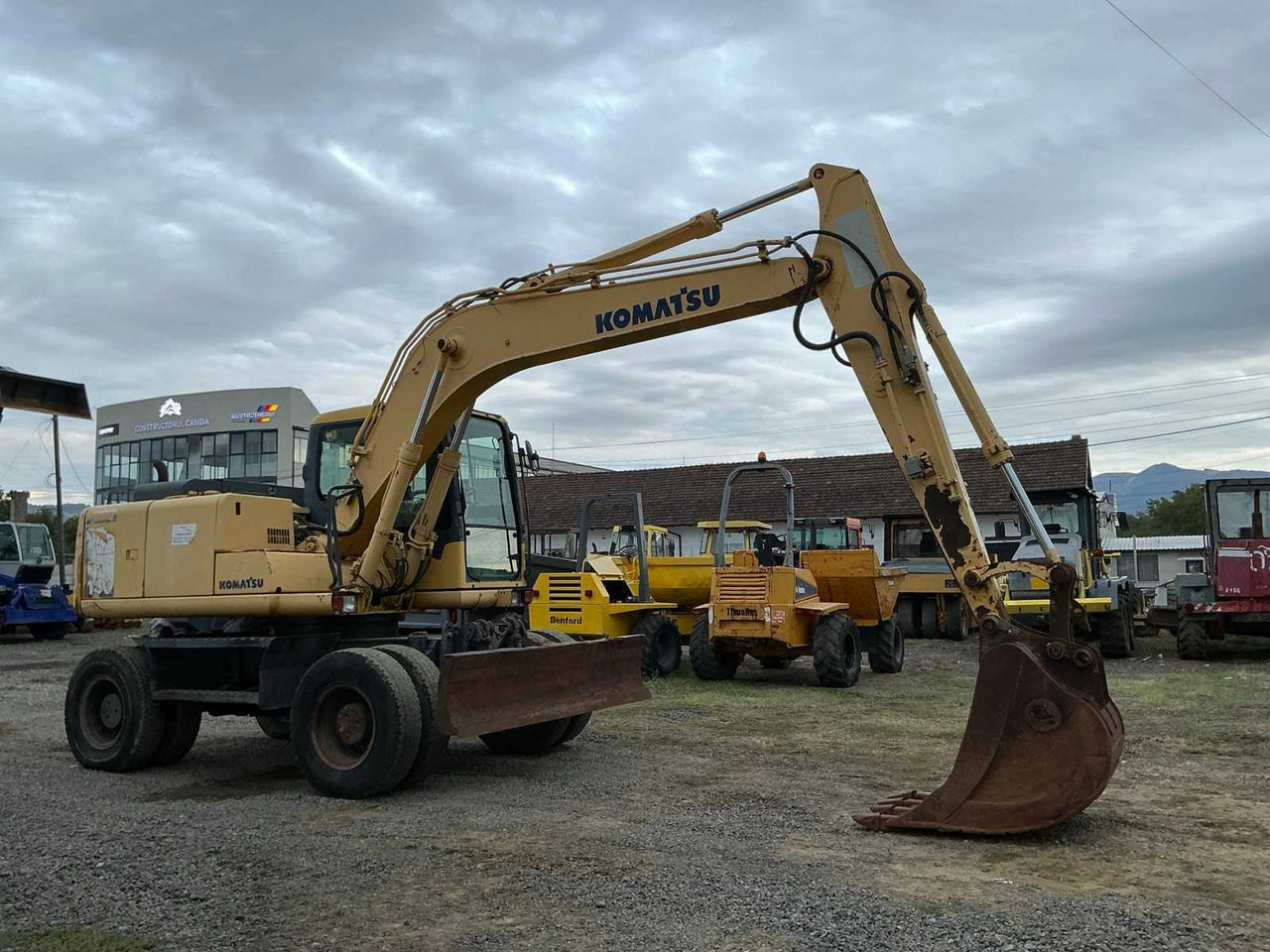 Komatsu PW 130 -7K - Bager na kotačima: slika Komatsu PW 130 -7K - Bager na kotačima Komatsu PW 130 -7K - Bager na kotačima: slika Komatsu PW 130 -7K - Bager na kotačima