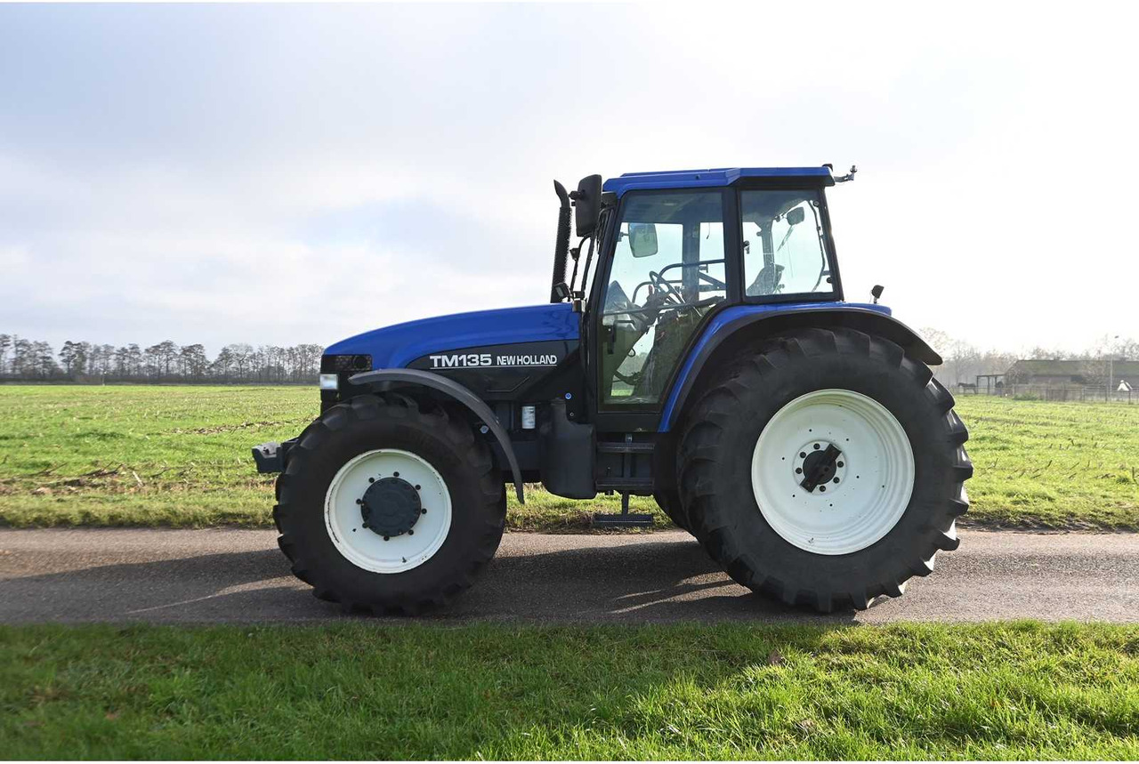 NEW HOLLAND - 1998 - TM135 - ALL-WHEEL DRIVE FARM TRACTOR - Traktor: slika NEW HOLLAND - 1998 - TM135 - ALL-WHEEL DRIVE FARM TRACTOR - Traktor NEW HOLLAND - 1998 - TM135 - ALL-WHEEL DRIVE FARM TRACTOR - Traktor: slika NEW HOLLAND - 1998 - TM135 - ALL-WHEEL DRIVE FARM TRACTOR - Traktor