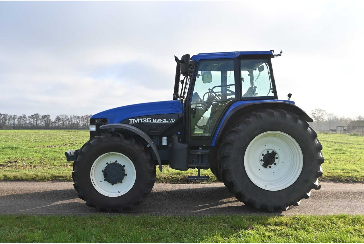 NEW HOLLAND - 1998 - TM135 - ALL-WHEEL DRIVE FARM TRACTOR - Traktor: slika NEW HOLLAND - 1998 - TM135 - ALL-WHEEL DRIVE FARM TRACTOR - Traktor NEW HOLLAND - 1998 - TM135 - ALL-WHEEL DRIVE FARM TRACTOR - Traktor: slika NEW HOLLAND - 1998 - TM135 - ALL-WHEEL DRIVE FARM TRACTOR - Traktor